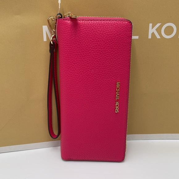 MICHAEL KORS
Leather Continental Wristlet Phone Case Wallet
Electric Pink
NWT - Picture 12 of 16